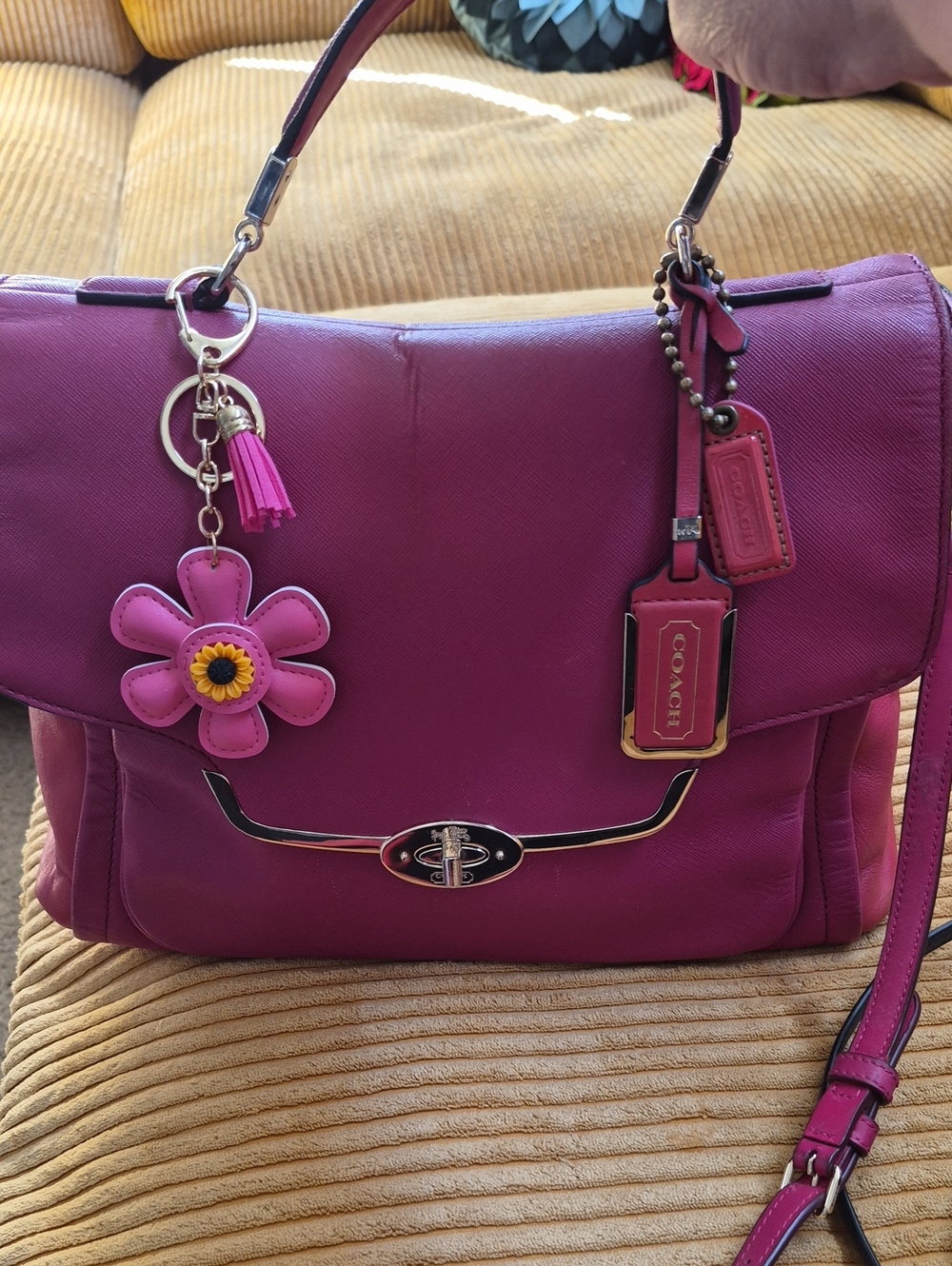 Coach Pink Leather Satchel with Floral Charm, Original Handtags, And Turnlock.